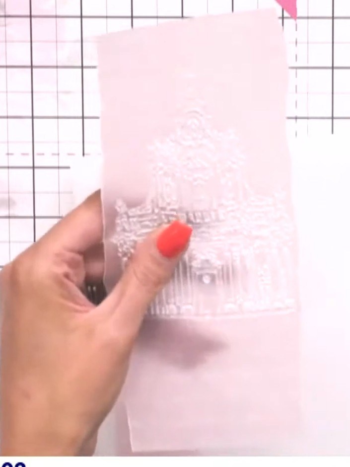 Step 4: Tear down the other side of the vellum panel in the same manner, creating a matching torn edge on the opposite