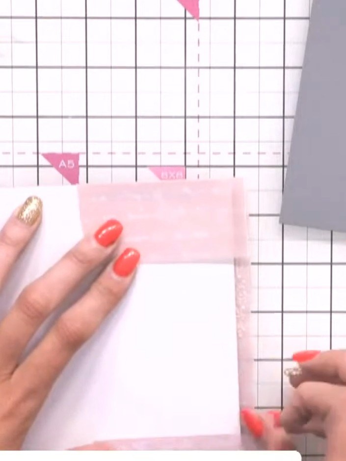 Step 8: Mount the completed topper onto a white card base using adhesive. Position centrally to create a clean, finish