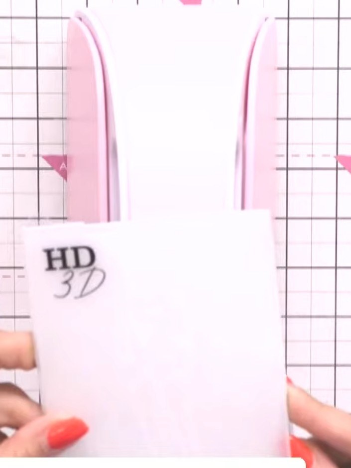 Step 1: Run the Jasper embossing folder through your die-cutting machine with white card stock to create a textured ba
