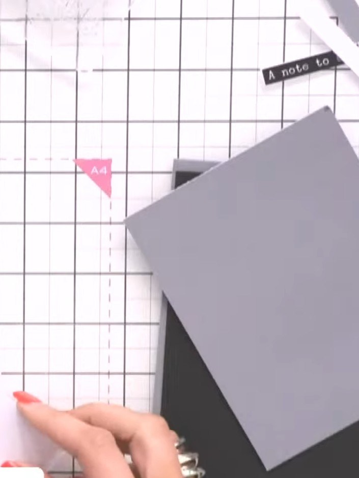 Step 2: Run the Jasper embossing folder through your die-cutting machine again, this time using grey card stock to cre