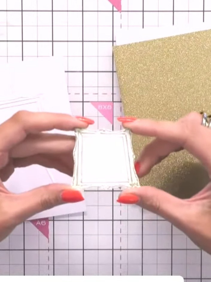 Step 1: Run the Invited embossing folder through your die-cutting machine with white card stock to create the embossed