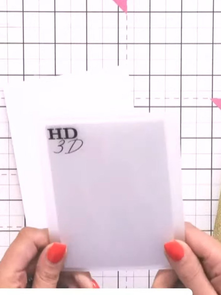 Step 2: Run the Invited embossing folder through your die-cutting machine again, this time using gold glitter card sto