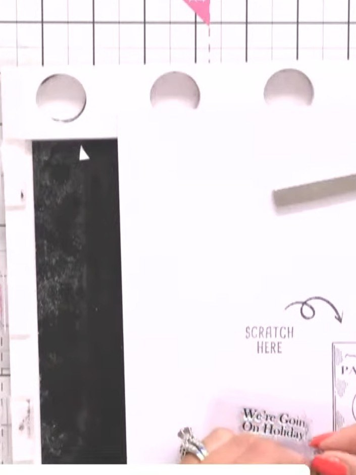 Step 2: Using the arrow stamps from the set, stamp arrows pointing in your chosen direction onto the passport design t