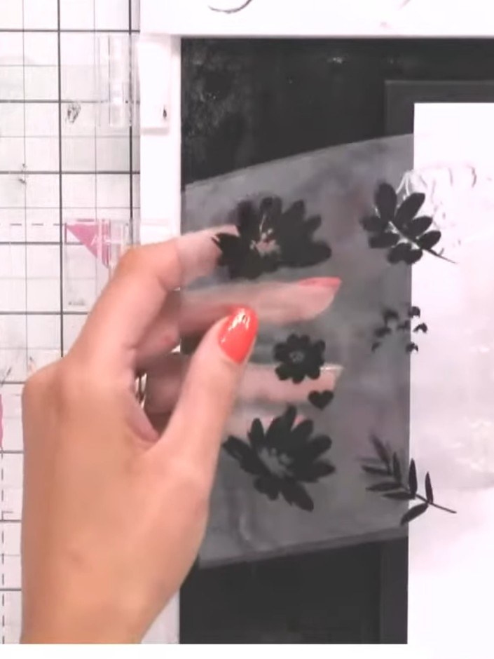 Step 1: Cut out the Stylish Chevrons cover plate die from the floral patterned paper. The die features a decorative ch