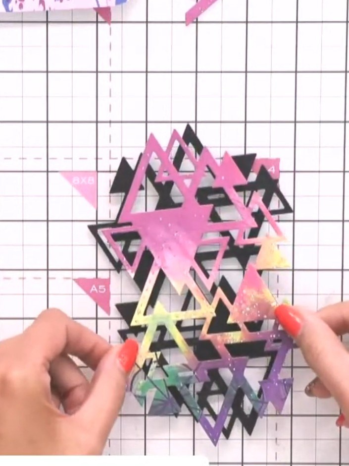 Step 3: Cut a second version of the triangles from black card stock using the same die. This will create the drop shad