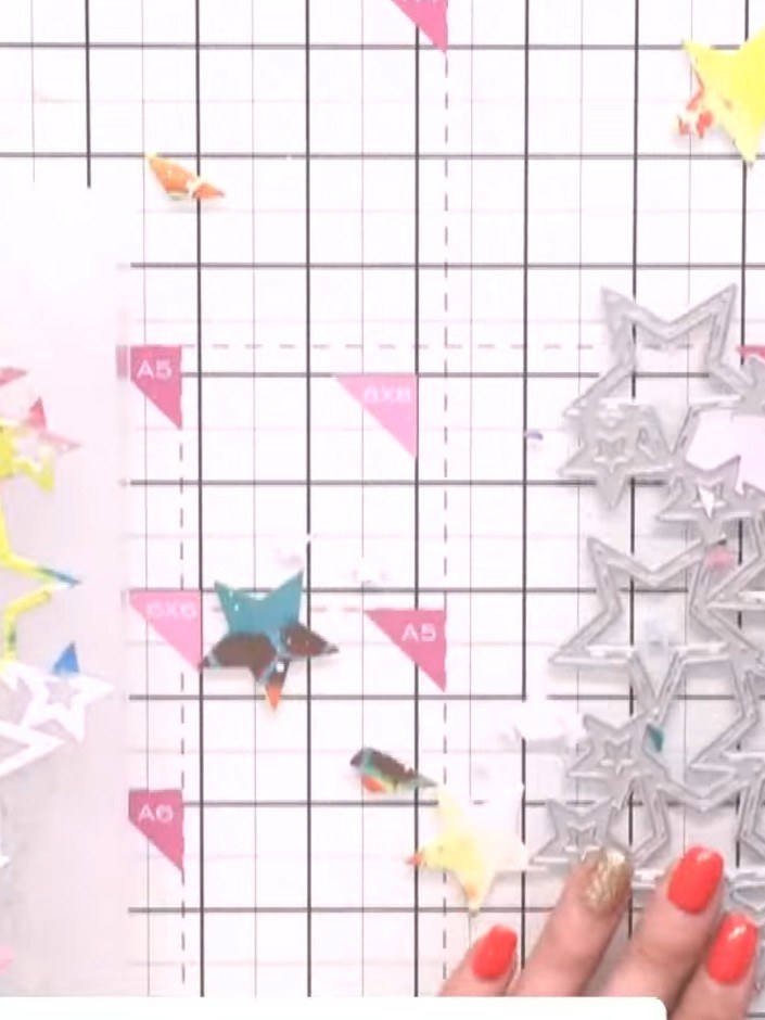 Step 3: Cut a backing piece from teal card stock using the same star cover plate die to create a coordinating mat laye