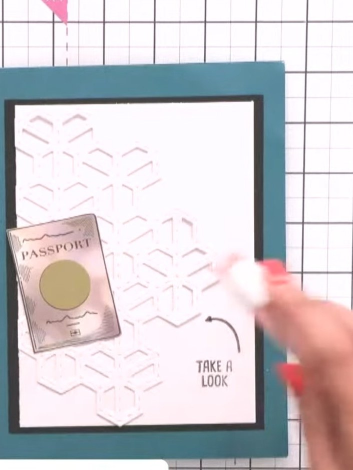 Step 6: Stamp an arrow design from the Fancy a Holiday stamp set onto the card front using the colourless glitter medi