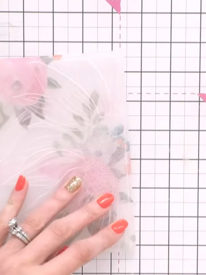Step 2: Place the vellum sheet with the floral design into your die-cutting machine using thick embossing plates. Run 