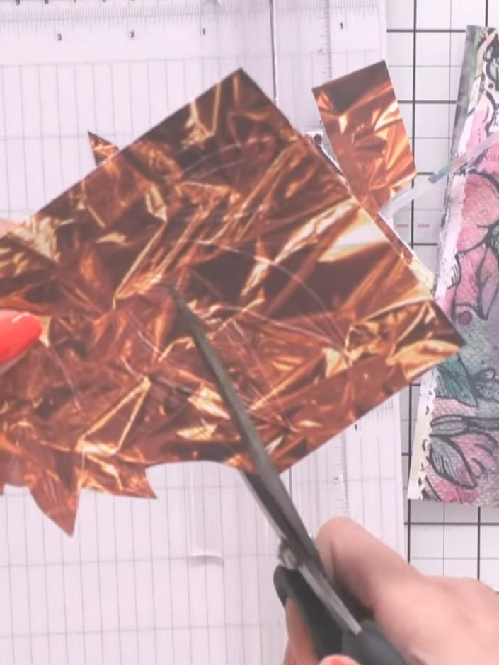 Step 4: Cut the copper foil into smaller pieces using scissors, making them easier to work with for your collage desig
