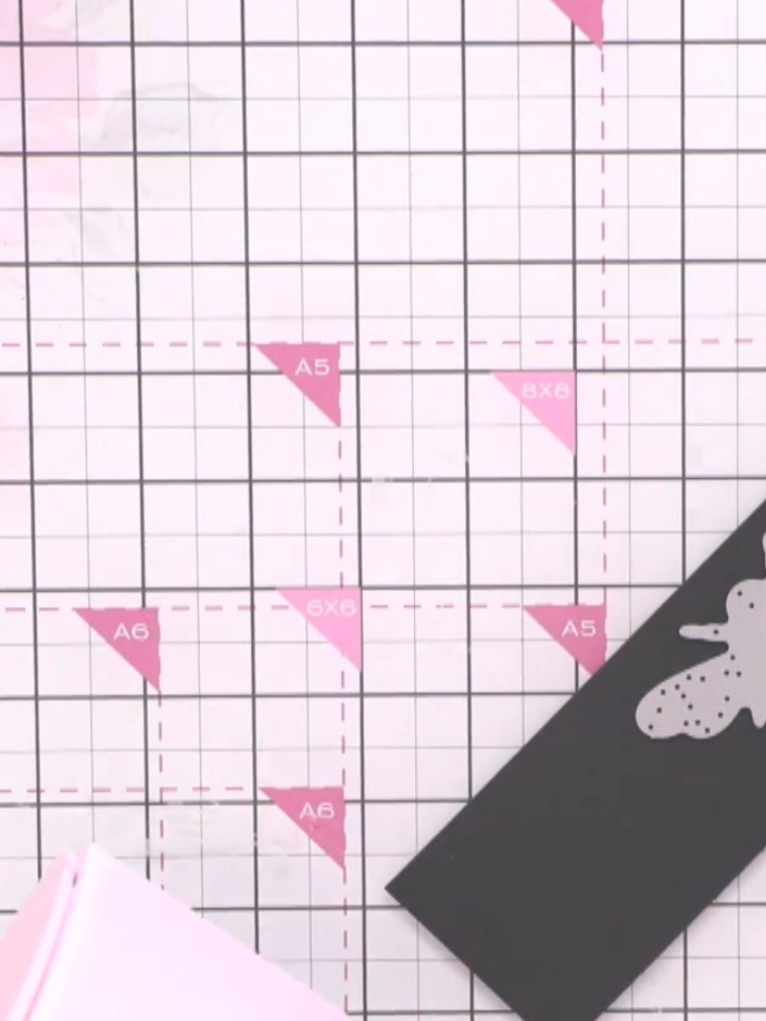 Step 7: Die-cut a large bee from black card stock using a cutting machine. Run the card through twice if needed to ens