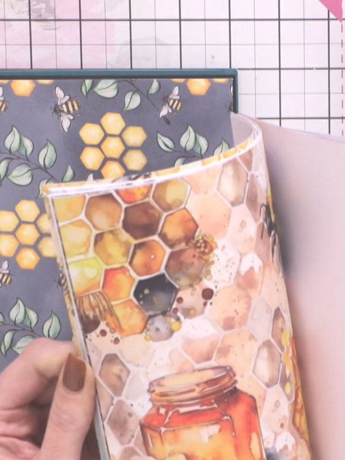 Step 3: Select a patterned paper from your pad and trim it to size for your focal panel. Mat the patterned paper onto 