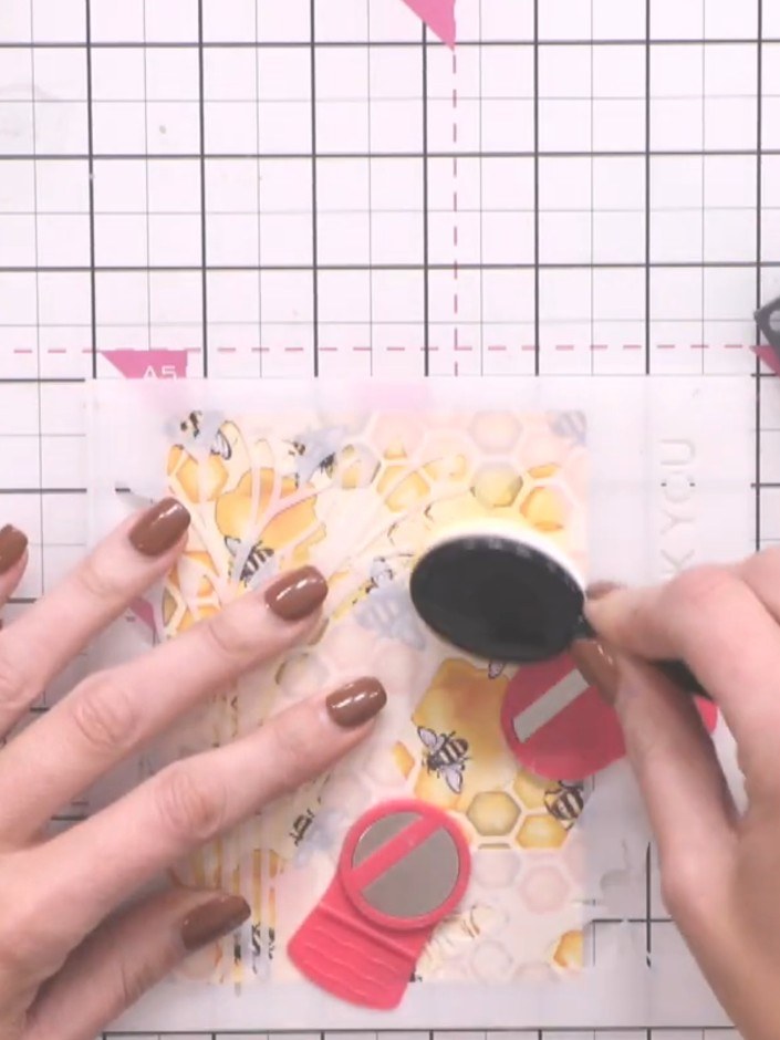 Step 5: Apply yellow ink through the honeycomb stencil using a blending brush. Work the colour into the stencil openin