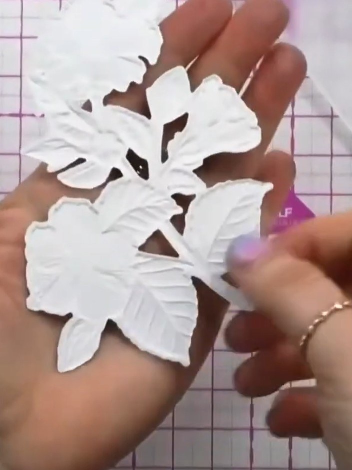 Step 11: Mount your completed four-layered hibiscus flower onto your prepared card base to finish your card. Position t