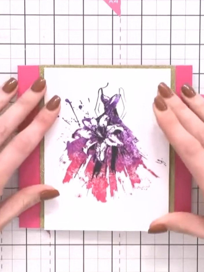 Step 7: Mount the stamped floral image onto a kraft card blank using pink panels on either side for a contrasting bord