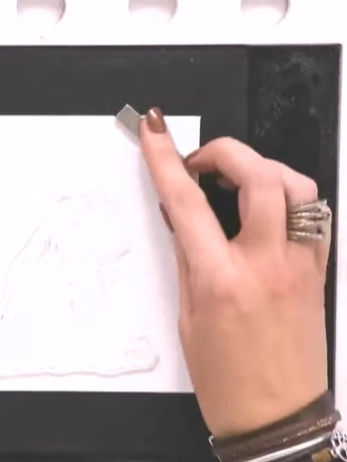 Step 4: Open the embossing folder and examine both sides. You'll have a debossed side and an embossed side to choose f