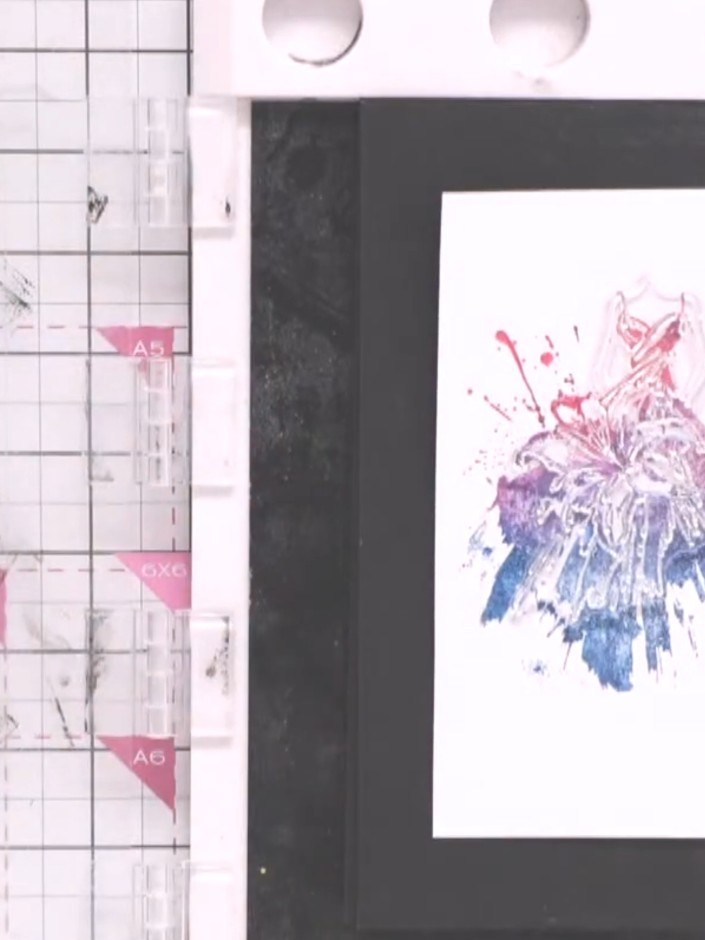 Step 6: Stamp the detailed gown image onto white cardstock using black ink. Press firmly and evenly to ensure all the 