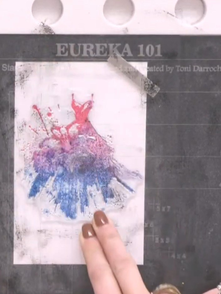 Step 3: Use a blending brush to blend the pink and blue colours together in the middle of the dress image, creating a 