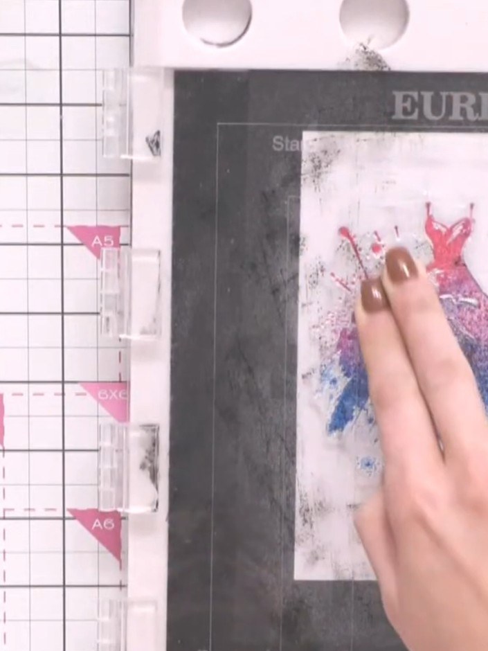 Step 4: Stamp the blended colour from your stamping platform onto white card stock. Use the dress stamp to transfer th