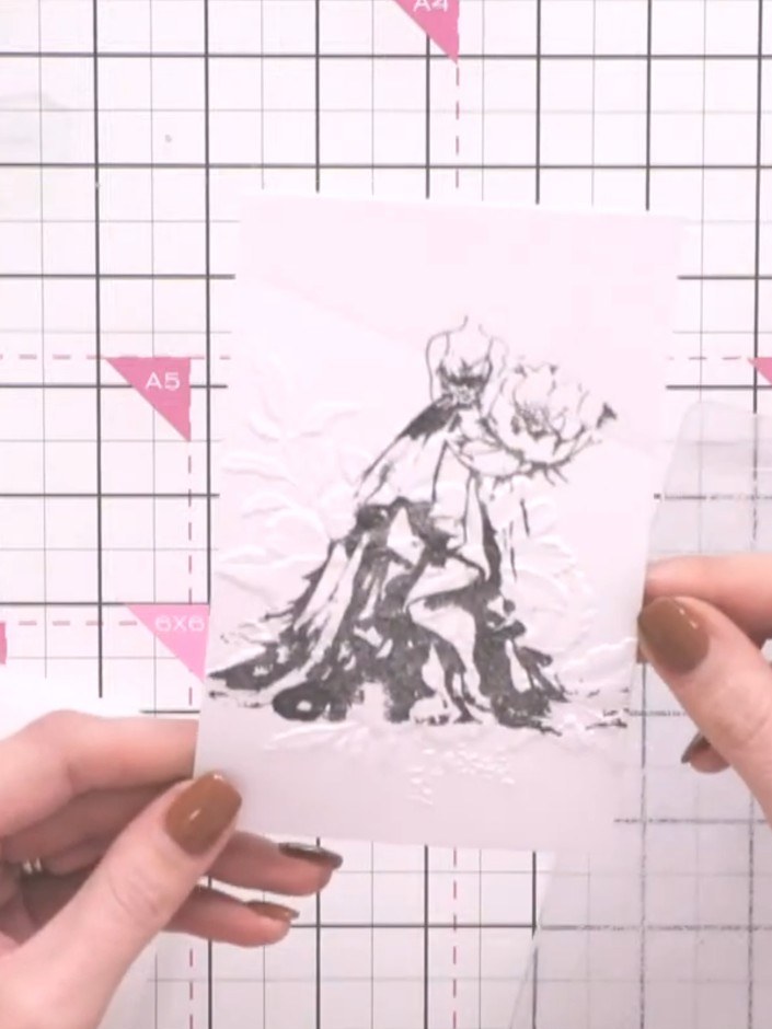 Step 7: If desired, add additional colours to the embossed flowers using the embossing folder to ink the design. For e