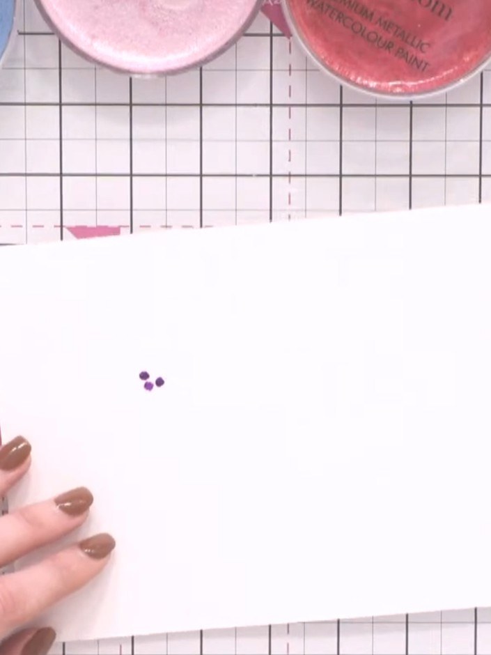 Step 3: Allow the water to carry the purple ink outward naturally across the paper, creating soft, diffused edges. Do 
