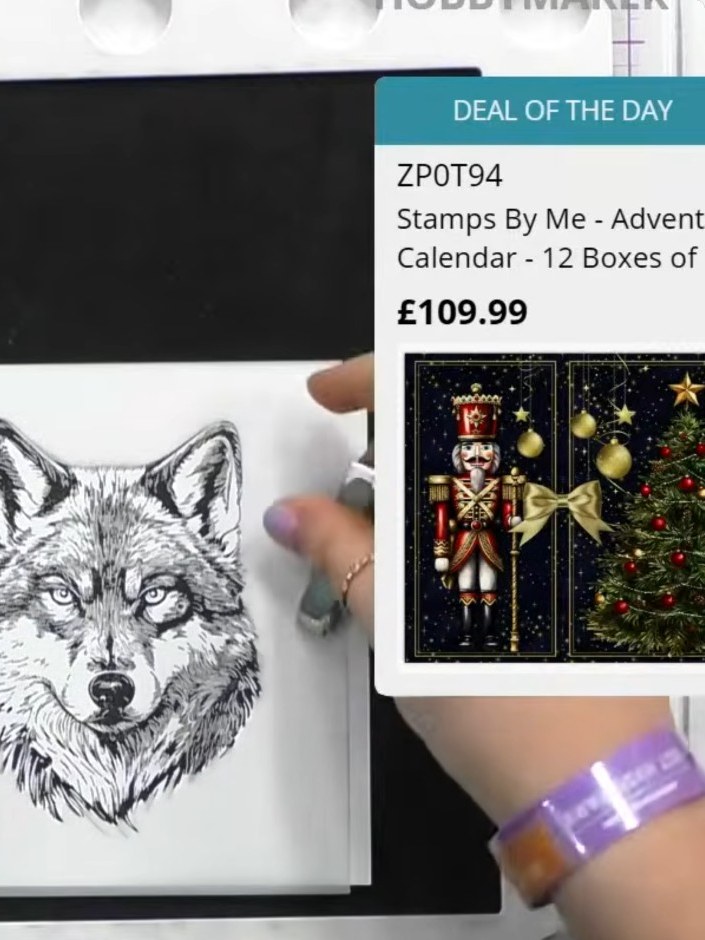 Step 2: Place the outside edge stencil over the stamped wolf image. Using a brush, ink through the stencil with brown 