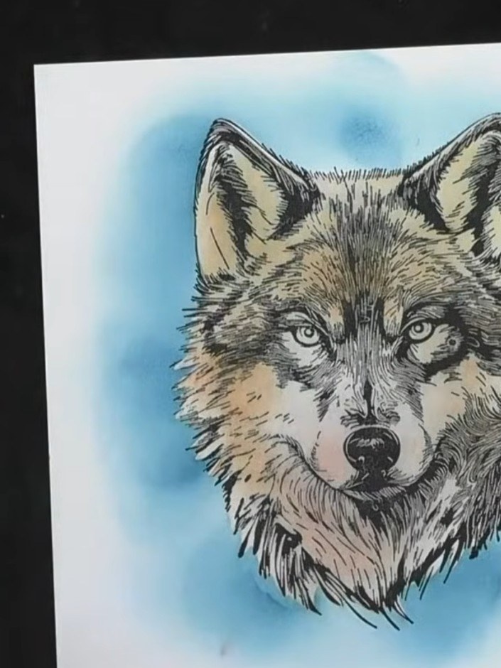 Step 5: Carefully remove the mask from the wolf image to reveal the finished layered effect. The wolf will now stand o