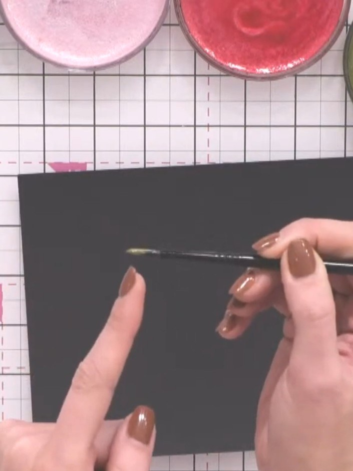 Step 2: Load your watercolour brush with confetti ink in Lagoon colour. Position the brush on the tip of the bristles 