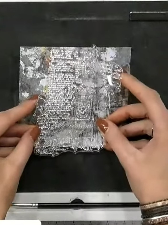 Step 4: Sprinkle gold embossing powder generously over the wet stamped image, ensuring all inked areas are completely 