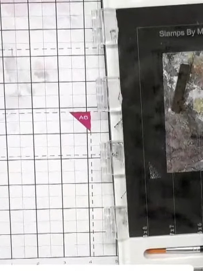 Step 6: Heat set the embossing powder using a heat gun, moving it steadily over the surface to melt the powder without