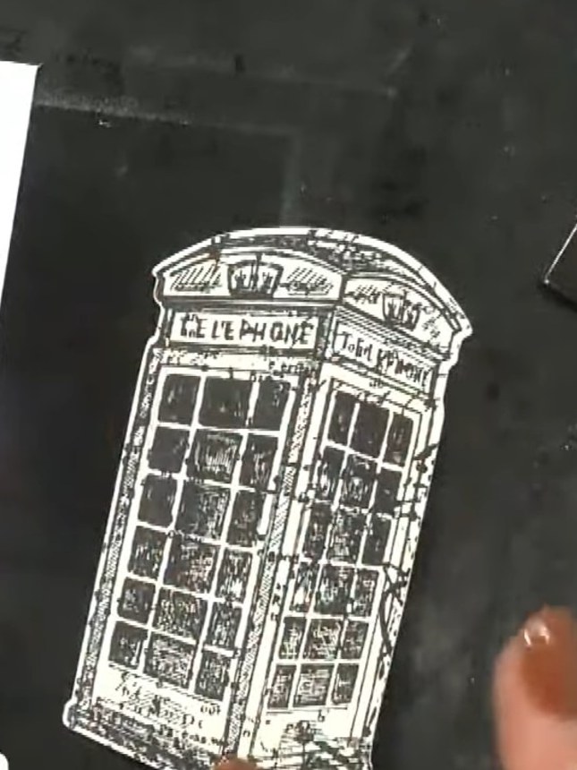 Step 6: If desired, add a small amount of colour to the flag at the top of the telephone box or other design elements 