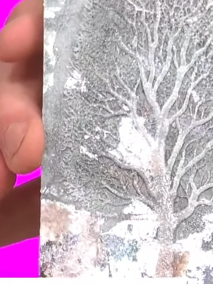 Step 5: Apply clear embossing powder over the finished ink work on your tree design, ensuring all the wet ink areas ar