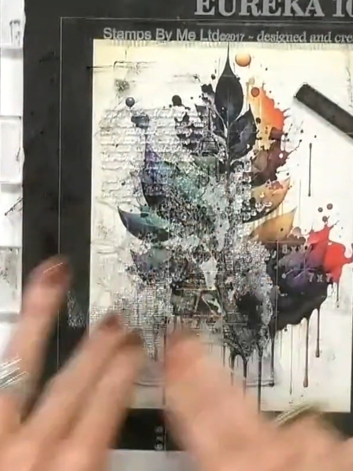 Step 4: Heat emboss the stamped feather image using clear embossing powder. This will add shine and definition to the 