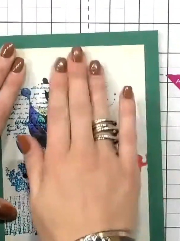 Step 6: Glue the die-cut tower flat over the stamped tower on the card front to create dimension in the foreground. Pr