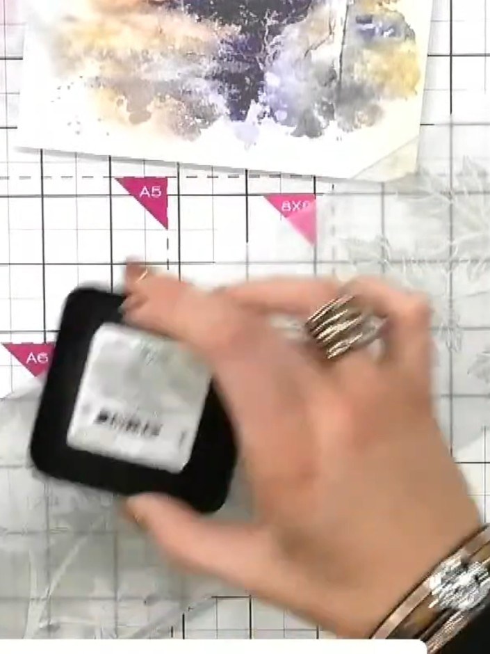 Step 2: Feel the embossing folder to identify which side has the raised design (the front). Mark this side if needed t
