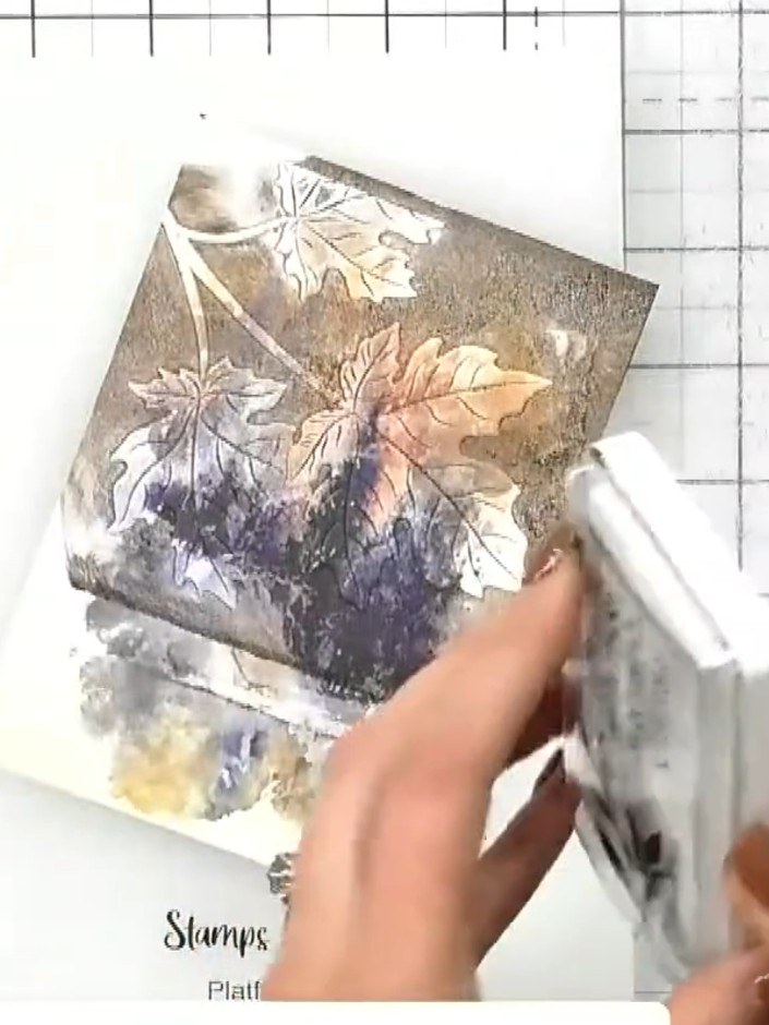 Step 4: Tap a white ink pad over the embossed leaves to highlight the details and bring back the definition that may h