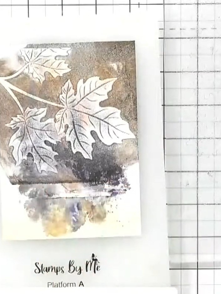Step 5: Mount the embossed leaf piece onto white craft card to create a border frame around the design. This will help
