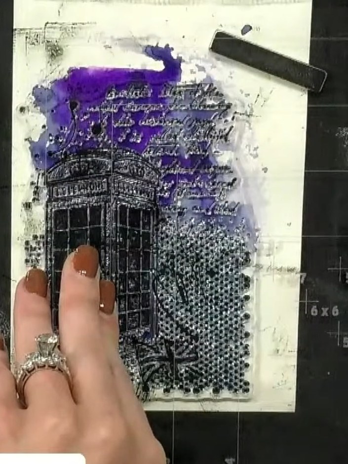 Step 7: Heat emboss the stamped tower image using clear embossing powder. Apply the powder over the stamped design, ta