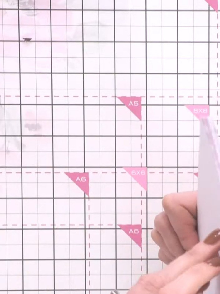 Step 1: Select a sheet of watercolour paper from the pad and die-cut it using the left and right wrap and fold dies to