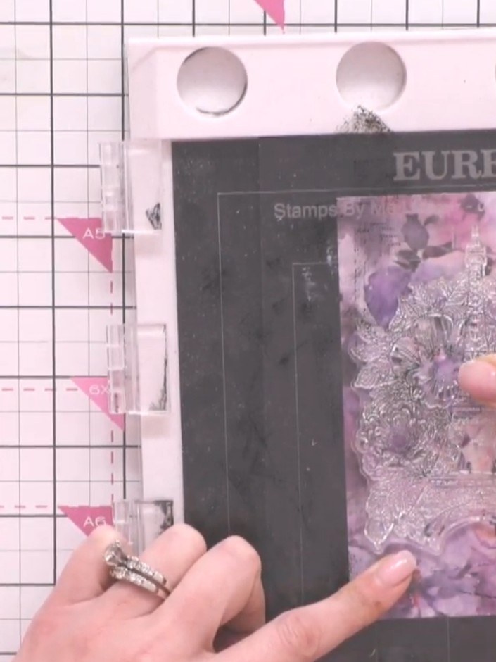 Step 3: Ink the floral stamp with embossing ink and stamp it twice over the image to ensure all the intricate details 