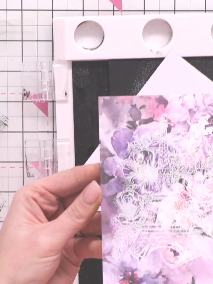 Step 4: Apply white embossing powder to the inked butterfly stamp. Heat set with a heat gun, moving it over the design
