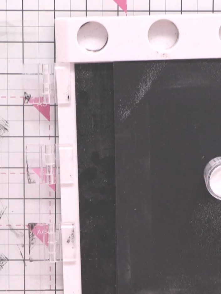 Step 5: Stamp the same floral design onto a second piece of patterned paper from the Bloom & Grow pad. Heat emboss thi