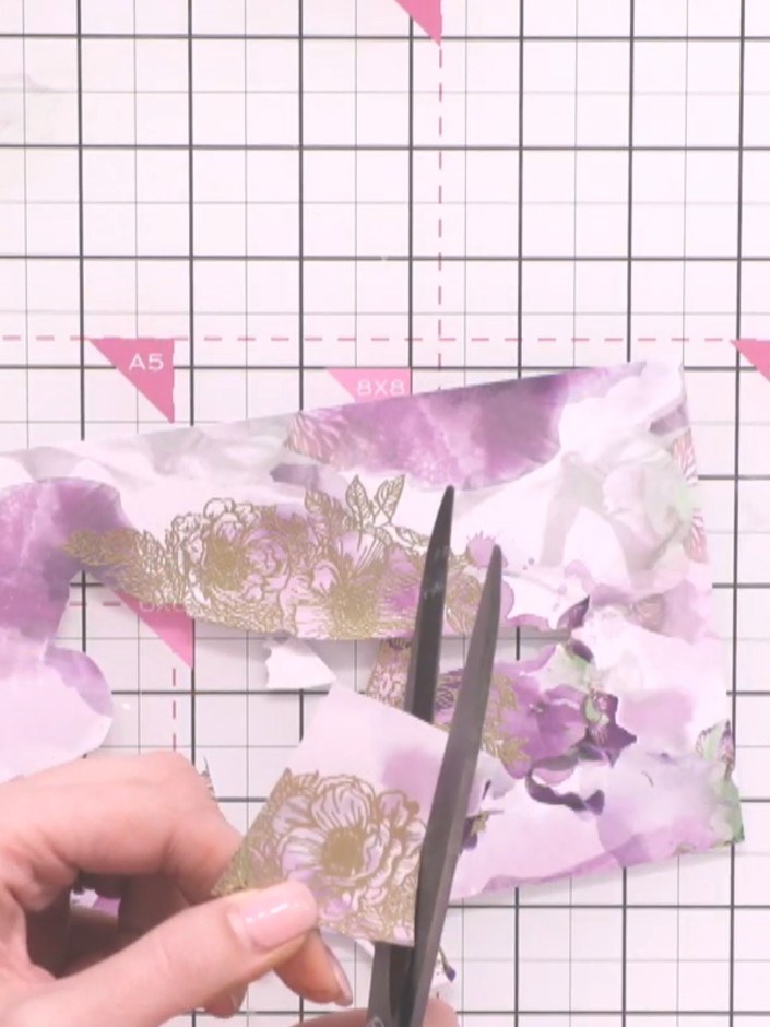 Step 9: Using scissors, carefully cut out the individual flower elements from your stamped and embossed design pieces.
