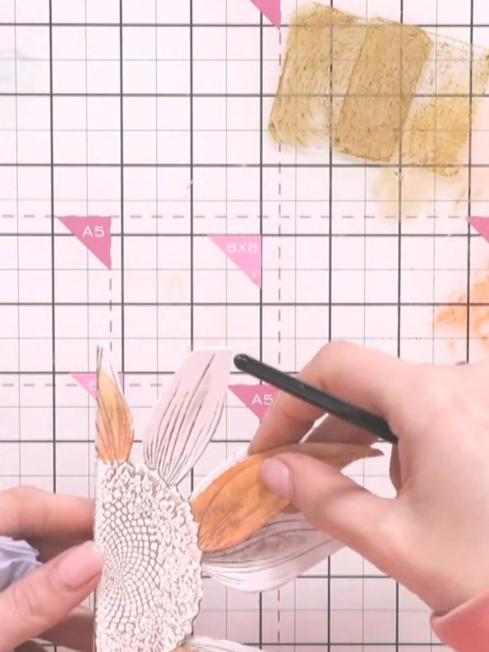 Step 10: Apply darker brown and orange tones to the second layer of petals. Add shadows underneath the petals to create