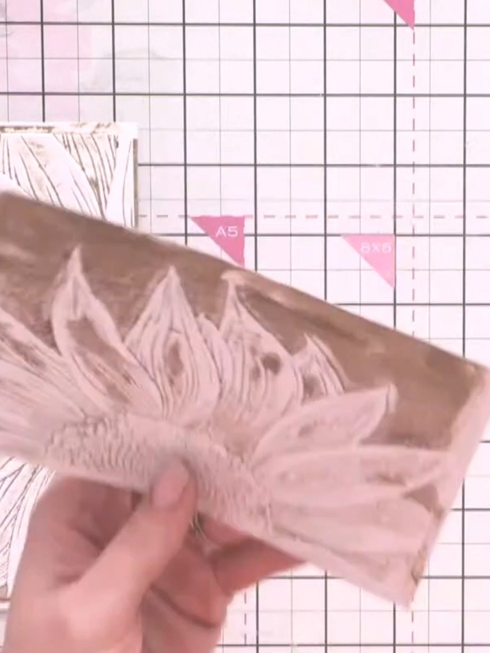 Step 6: Fussy cut around the entire outline of the first sunflower piece, following the edges of the petals carefully.
