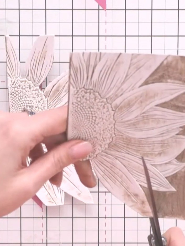 Step 8: Fussy cut the third sunflower piece, removing even more detail and leaving only select petals and the centre v