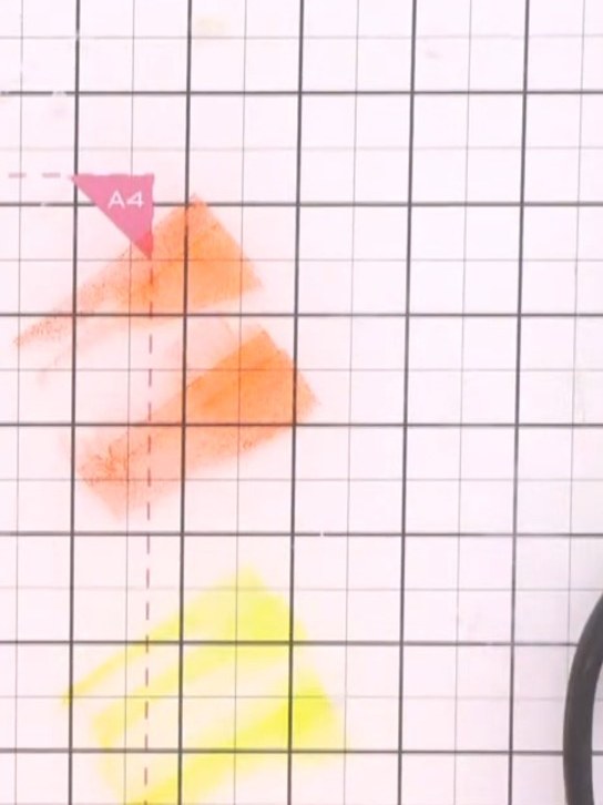 Step 9: Paint the first base layer with watercolour, starting from the top with orange and blending down through yello