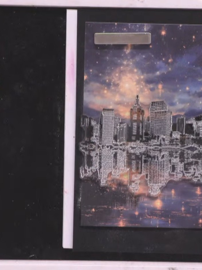 Step 3: Use a sticky ink pad to ink up the Sparkle Everyday stamp. Position the stamp along the horizon line of your c