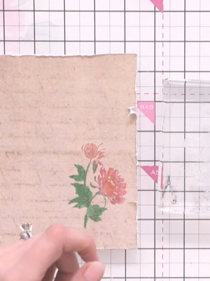 Step 7: Ink up the black detail layer of the same floral stamp with black or brown ink, ready to stamp onto your lamin
