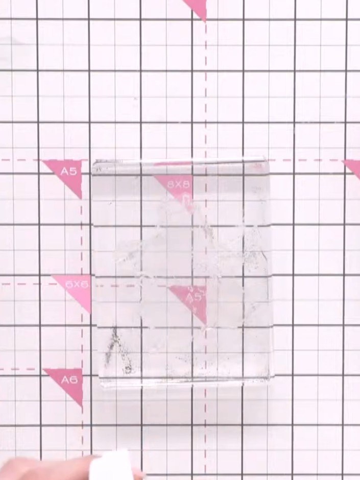 Step 3: Spritz the inked stamp with water twice using a water mister to create a watercolour effect on the stamped ima