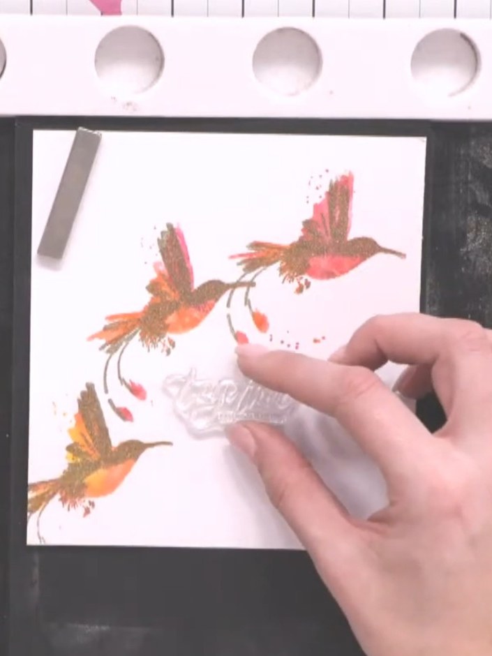 Step 12: Ink up a sentiment stamp with sticky embossing ink. Press the stamp firmly onto the card to transfer the senti